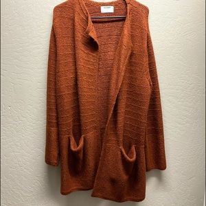 Cinnamon long duster with pockets.